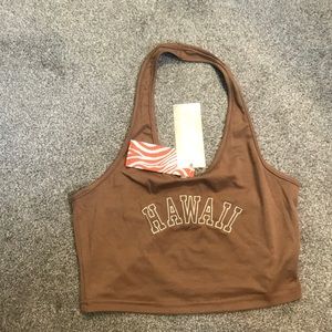 This is a Brown crop top shirt from ROMWE. It says Hawaii on it. Size small.